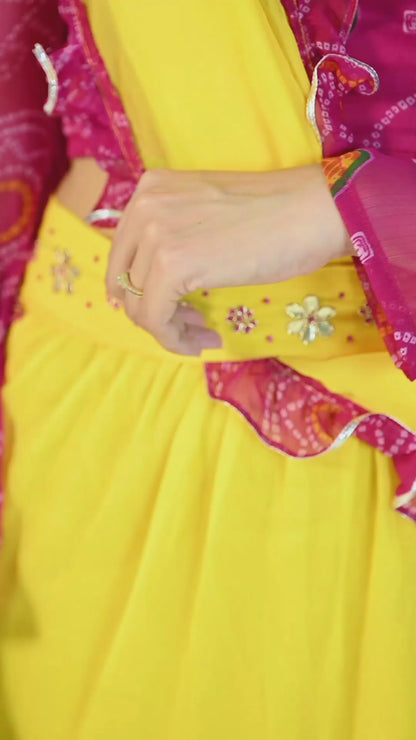 Yellow Skirt with attached Dupatta and Pink Bandhani Handwork Crop top Set
